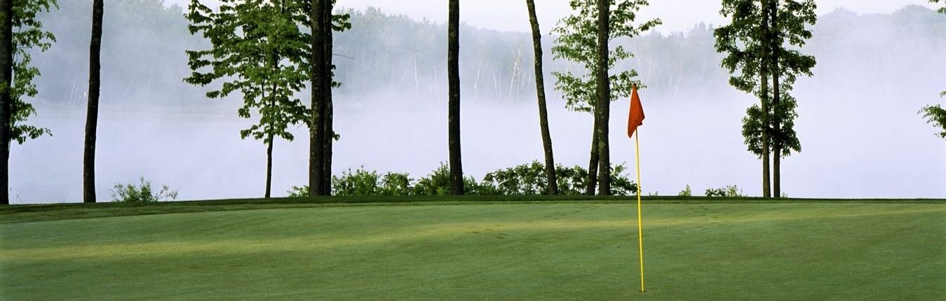 golf green on a foggy morning