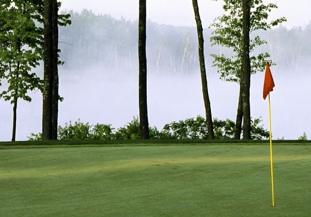 golf green on a foggy morning