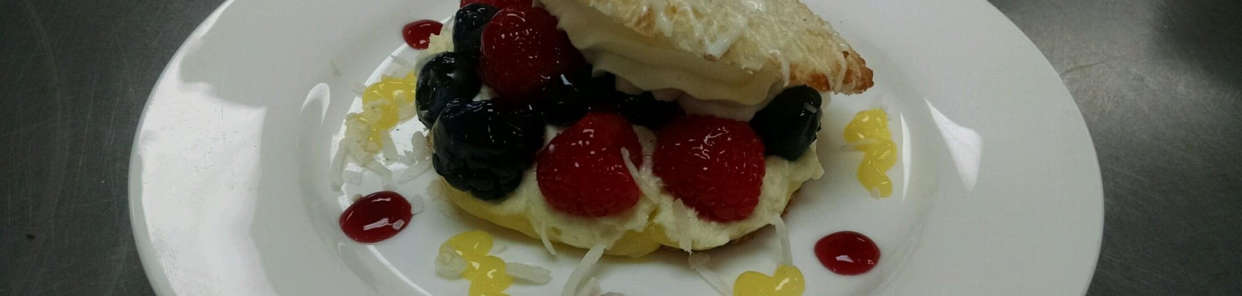 Berry and custard dessert with coconut