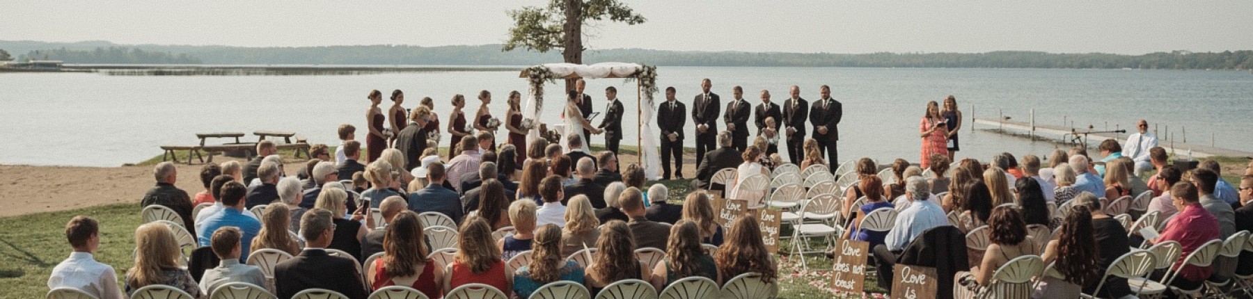 Outdoor lakeside wedding ceremony