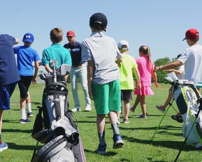 Junior golfers at golf camp at Madden's on Gull Lake