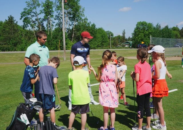 Junior golfers at golf camp at Madden's on Gull Lake