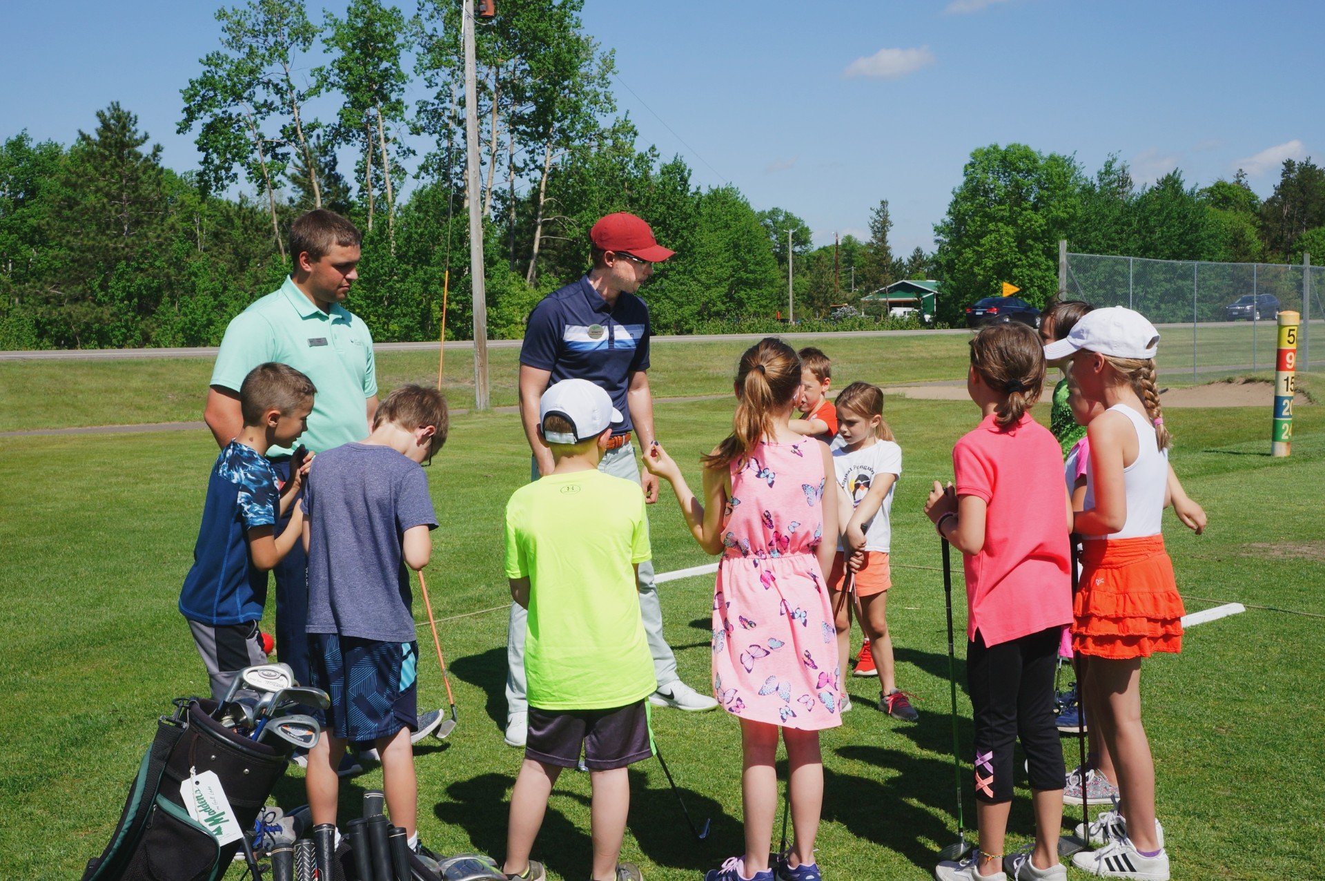 Junior golfers at golf camp at Madden's on Gull Lake