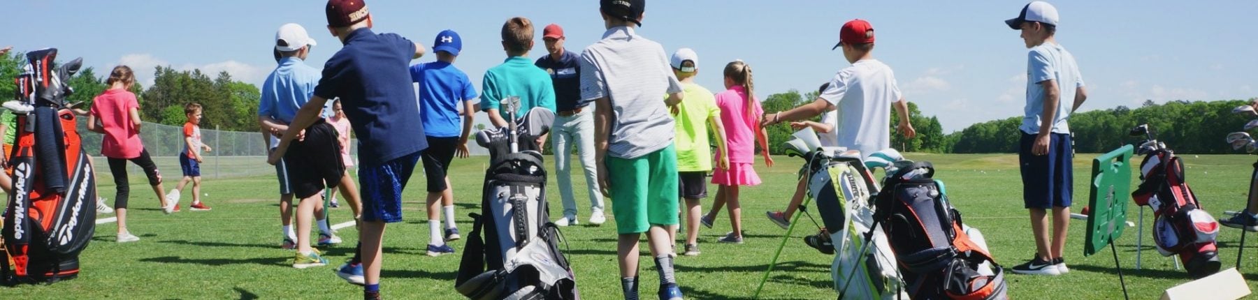 Junior golfers at golf camp at Madden's on Gull Lake