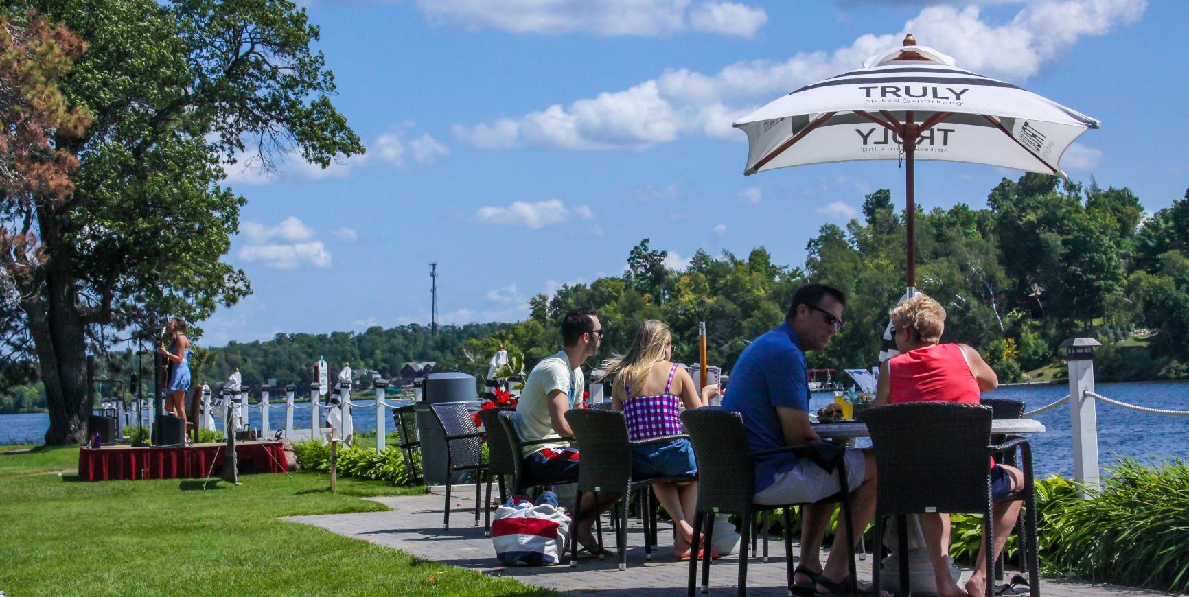 Guests seated on the Mission Point patio dining area