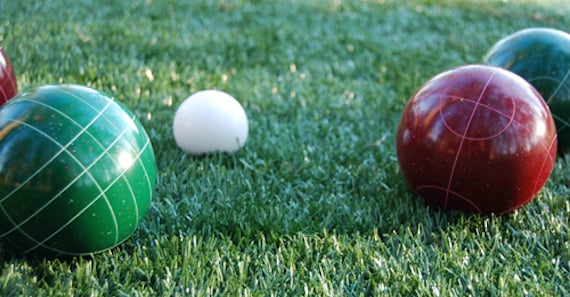 Close-up of bocce balls on grass