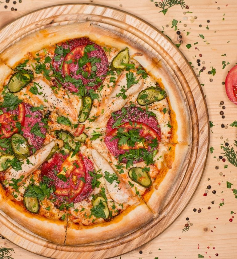 Pizza served on a plate and placed on the table