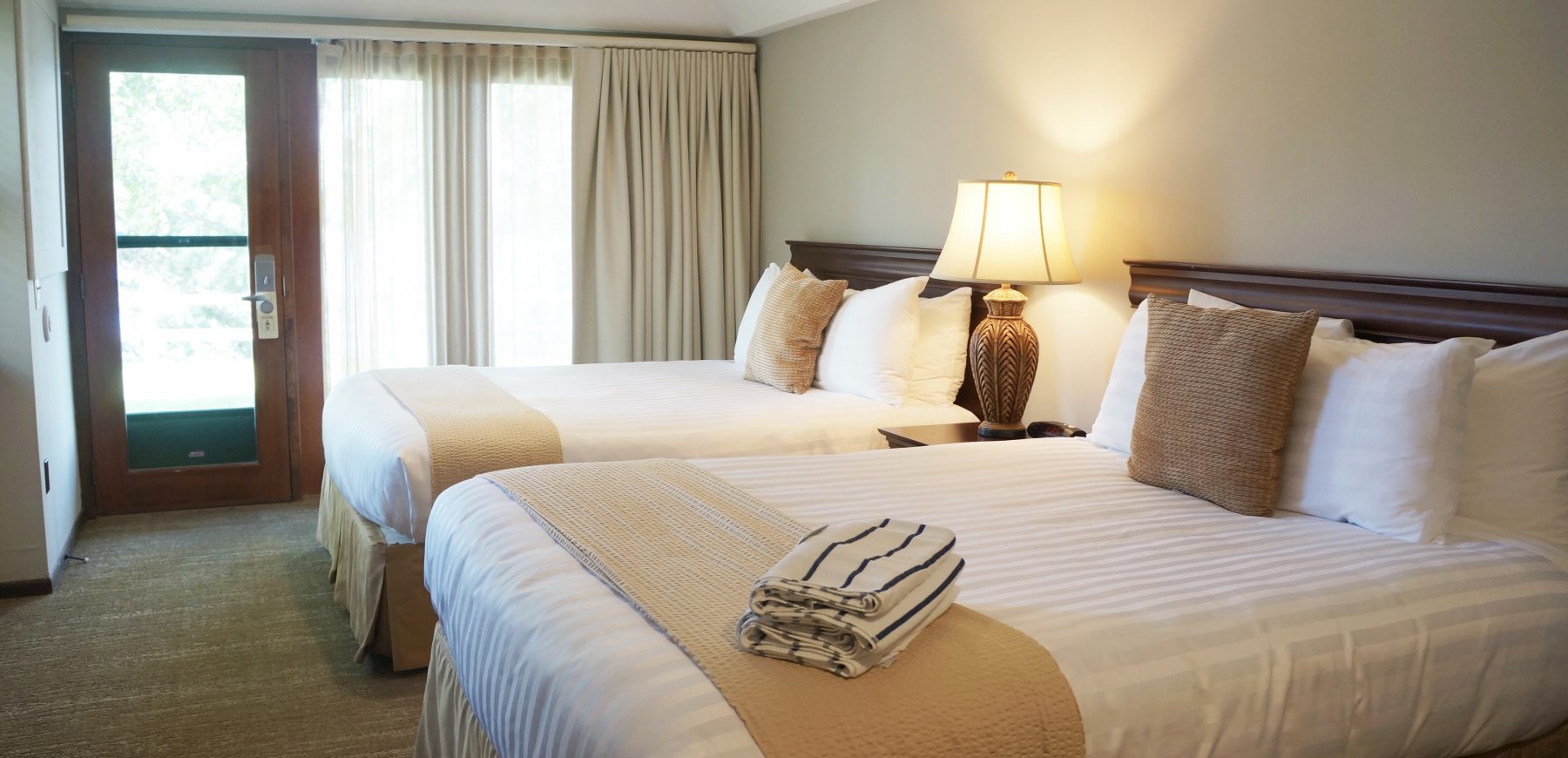 Two Queen beds in the Lake House bedroom