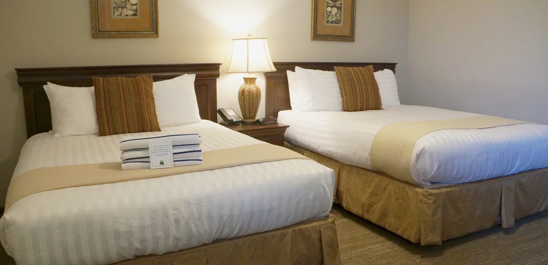 Two Queen beds in the Lake House bedroom