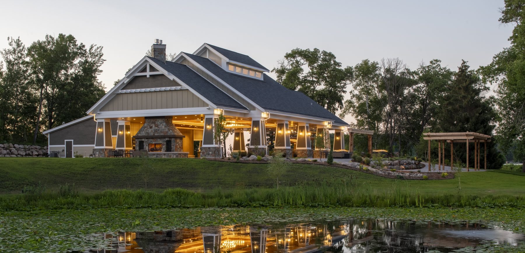 Maddens Pavilion building exterior facing a pond