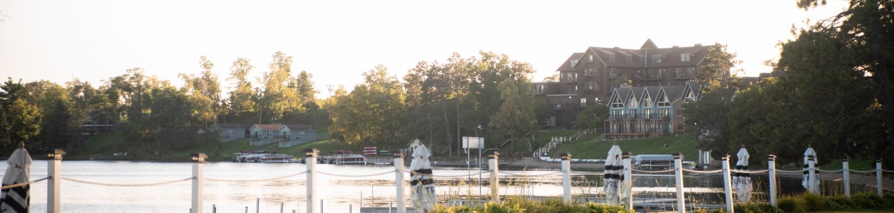 The rope and wood fence overlooking the Gull Lake in front of the Maddens resort.