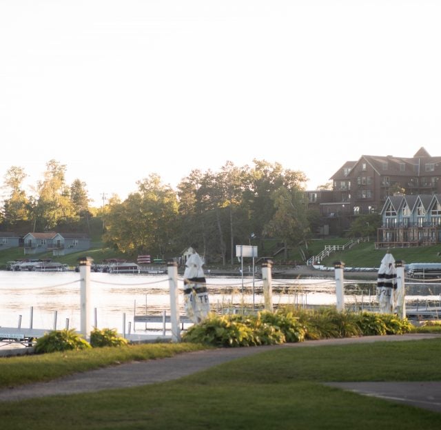 The rope and wood fence overlooking the Gull Lake in front of the Maddens resort.