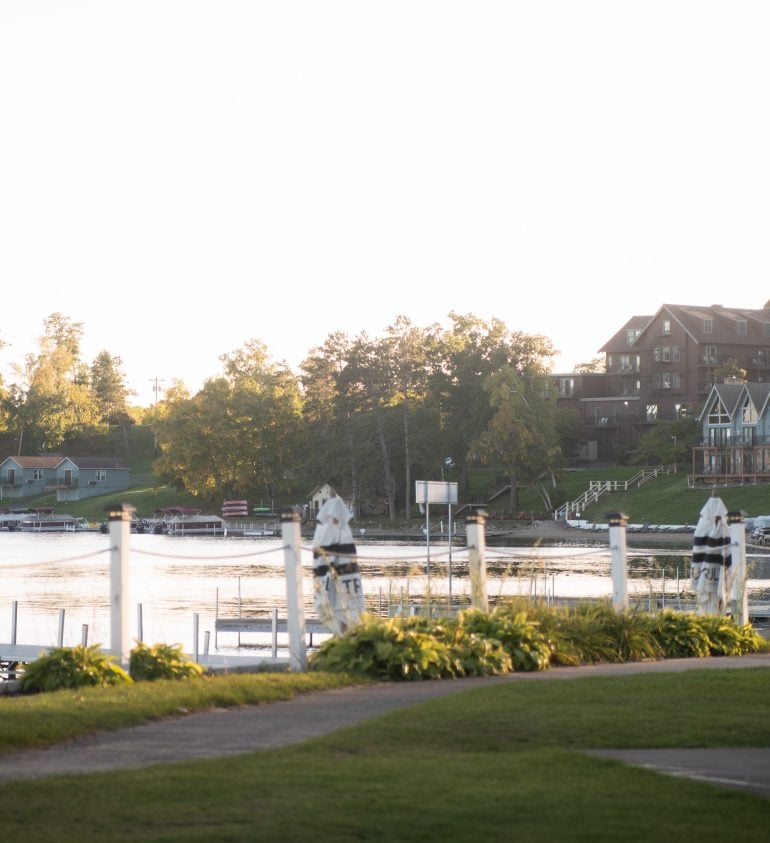 The rope and wood fence overlooking the Gull Lake in front of the Maddens resort.