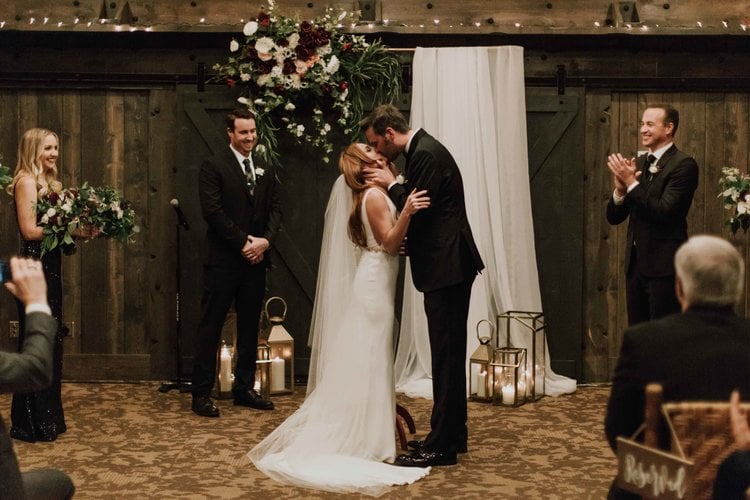 Bride and groom sharing a kiss