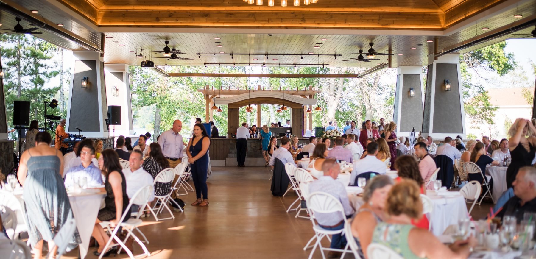 Wedding guests seated at the dining tables in the Pavilion