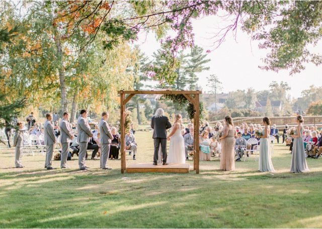 wedding ceremony outside under trees