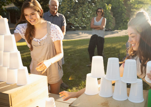 girls compete to stack cups