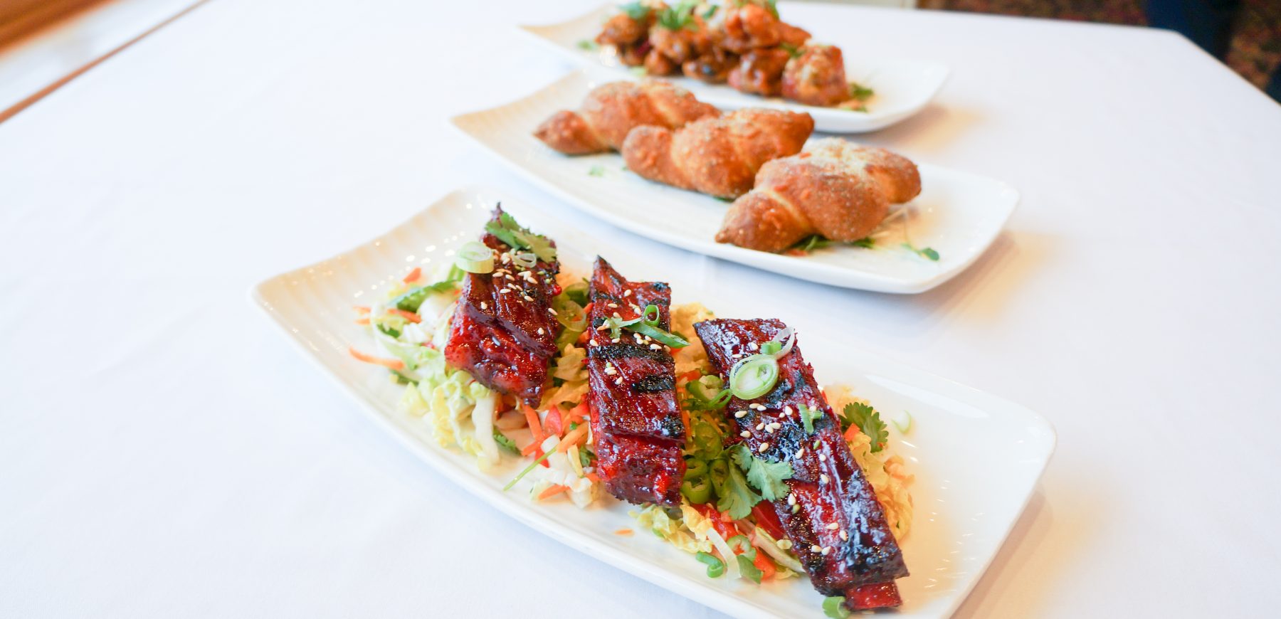 char siu pork ribs, chicken wings and pretzel knots