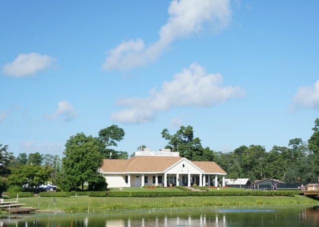tennis and croquet building across lagoon