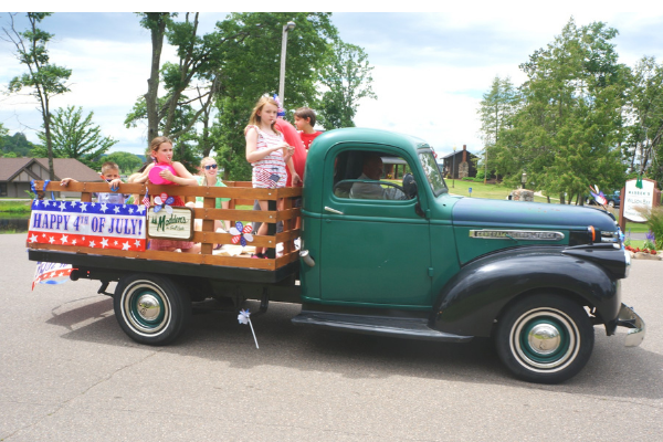 vintage pickup truck in a 4th of July parade