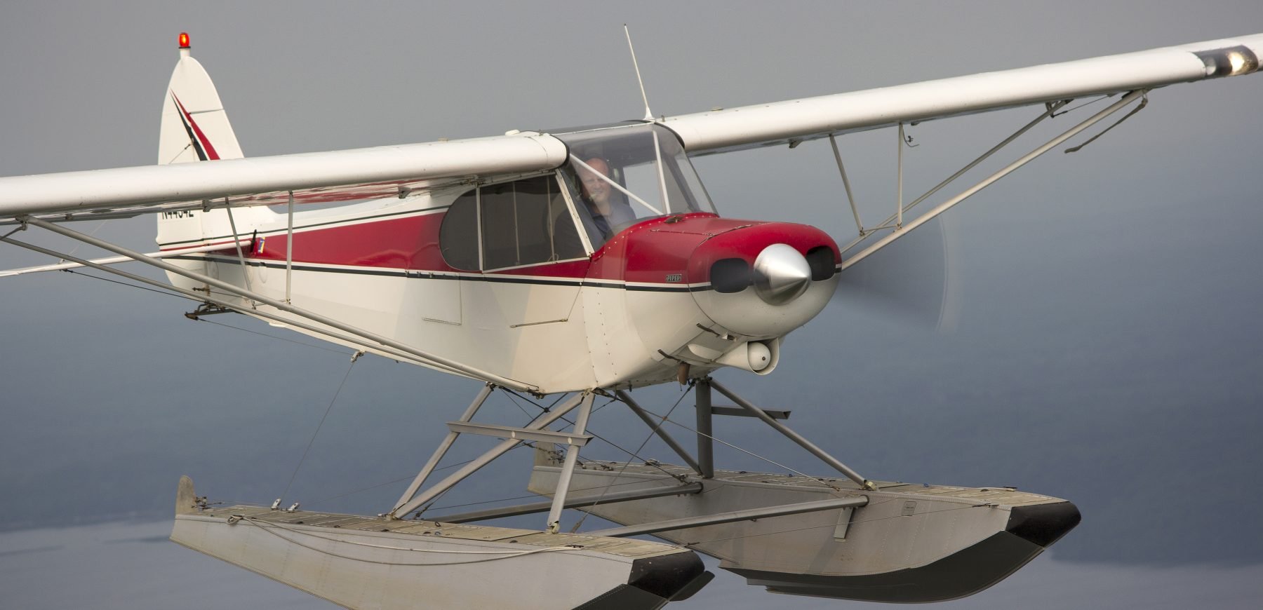 Super Cub Seaplane in Flight