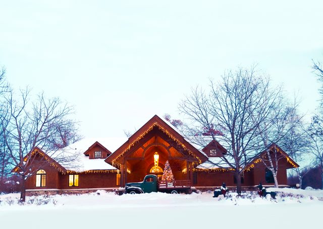 Madden's on Gull Lake at Christmas time covered in lights and snow
