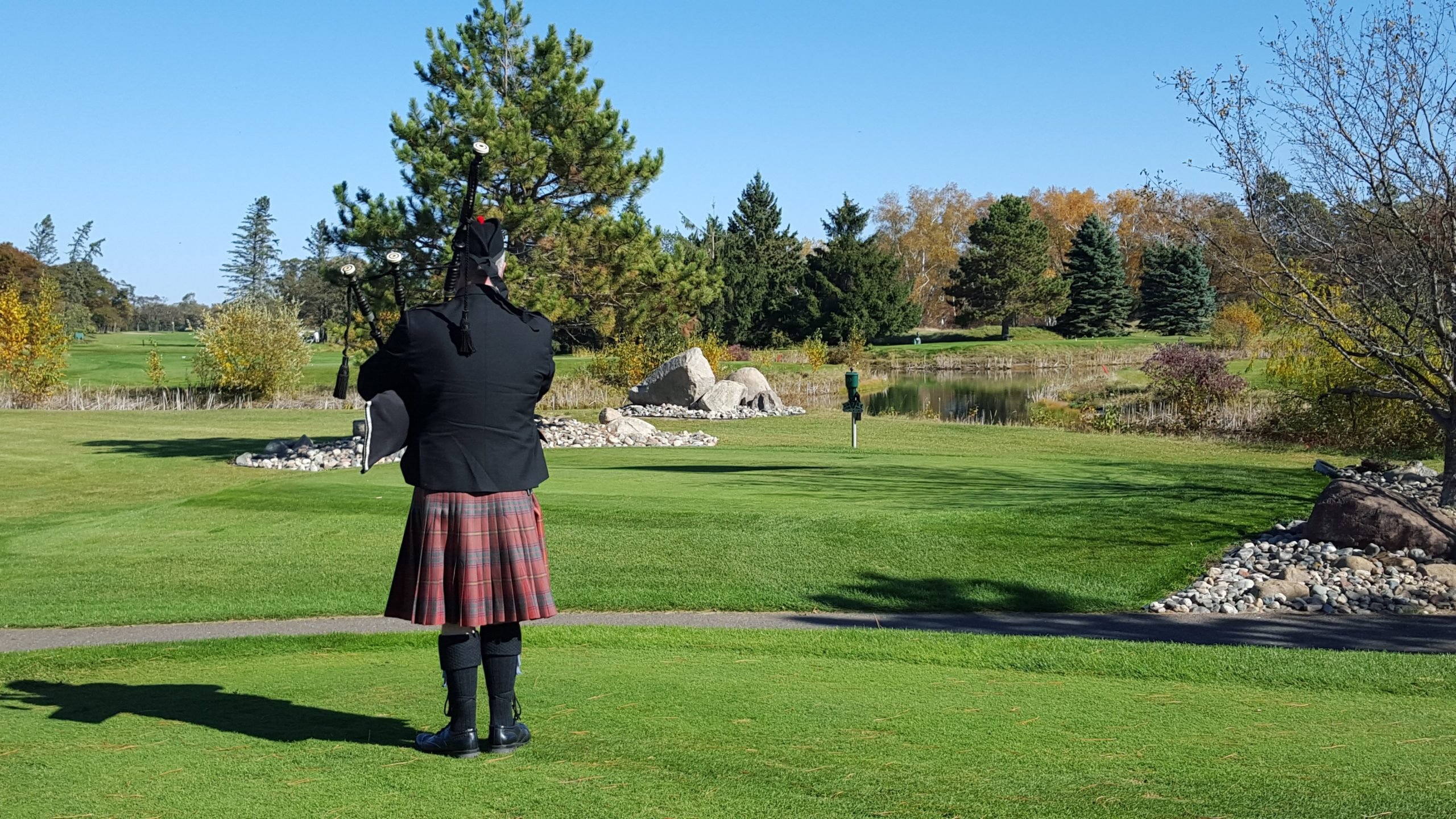 Rearview of a bagpiper